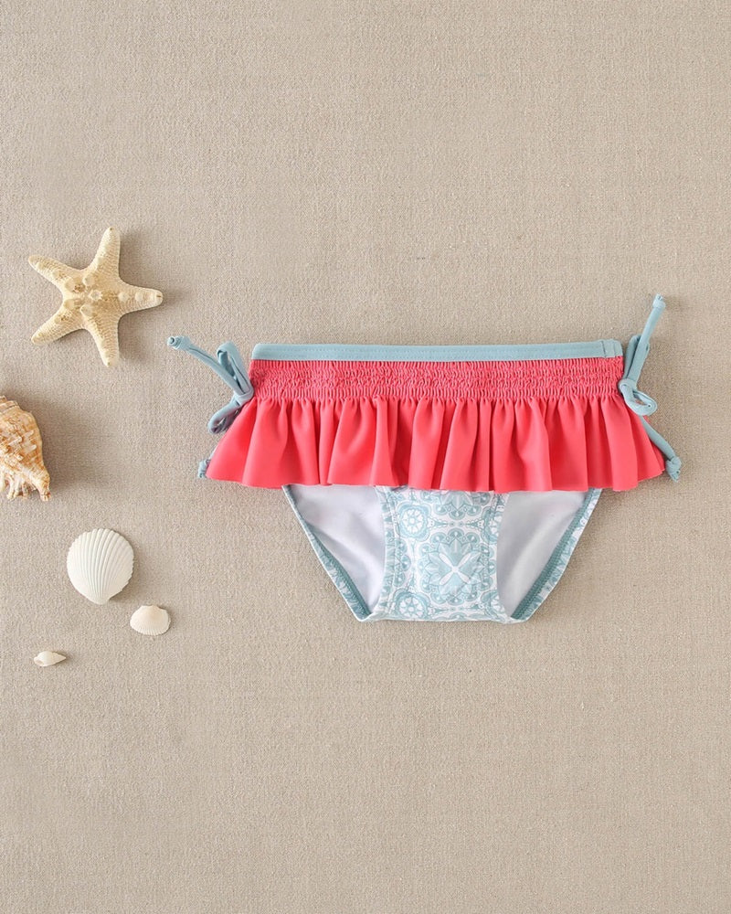 Culetín de bebé niña estampado retro azul y volante fucsia