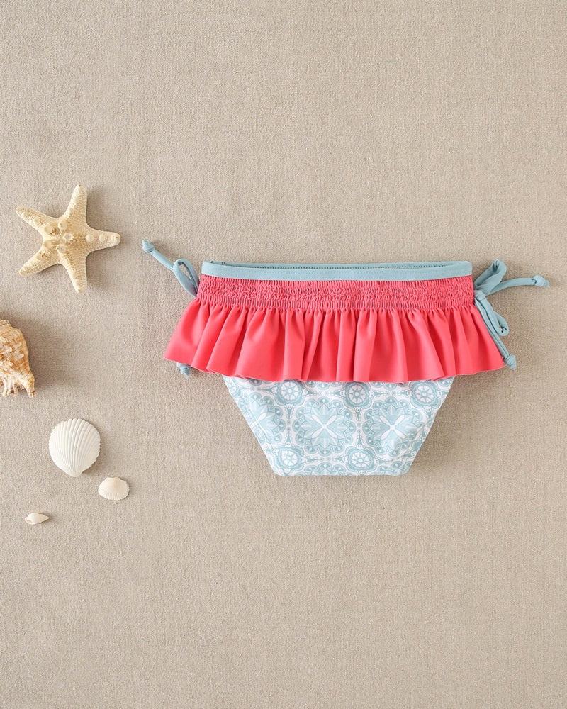 Culetín de bebé niña estampado retro azul y volante fucsia