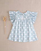 Vestido de niña azul cielo con lunares blancos y lazo