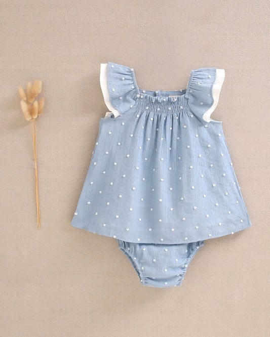 Vestido de bebé de plumeti azul con topos blancos