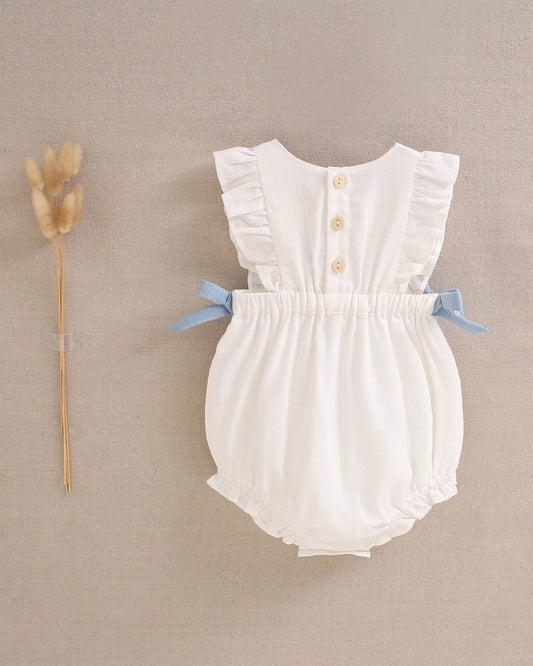 Ranita de bebé niña blanca con lazos laterales azules