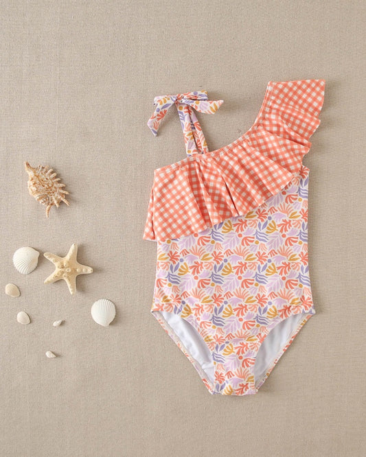 Bañador de niña con estampado floral y volante vichy naranja