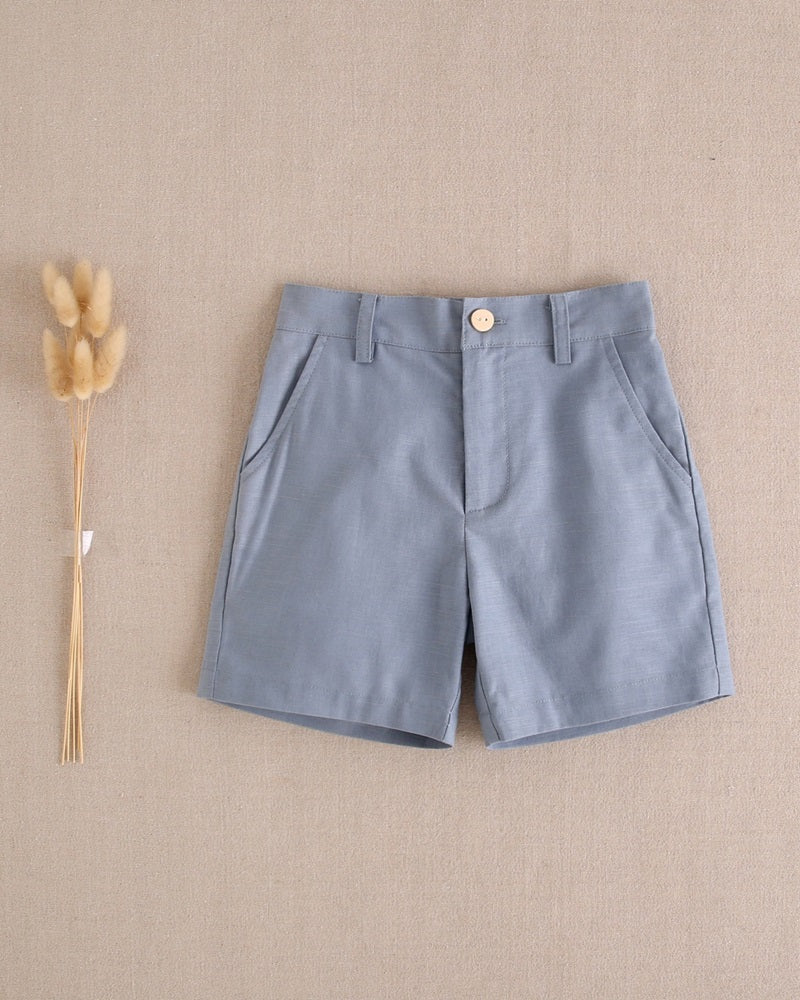Bermuda de niño de lino azul pastel oscuro