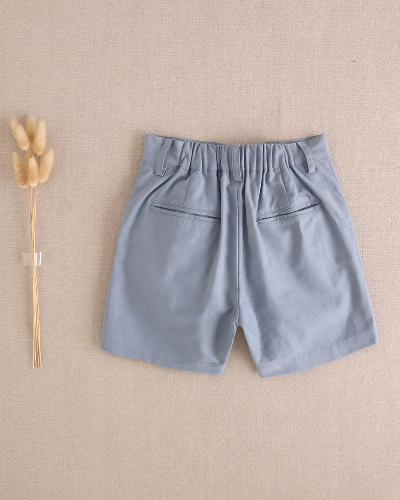 Bermuda de niño de lino azul pastel oscuro