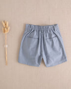 Bermuda de niño de lino azul pastel oscuro