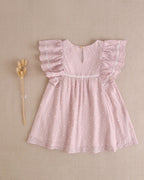 Vestido de niña de plumeti rosa con topitos blancos