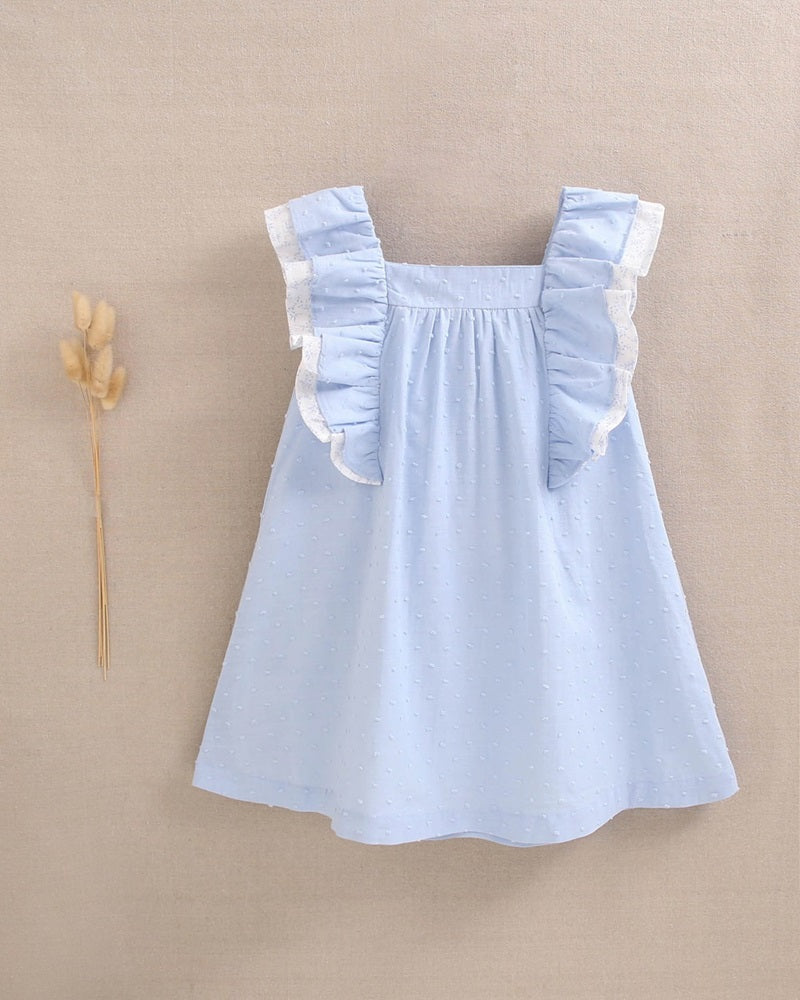 Vestido de niña de plumeti azul con volantes y lazo