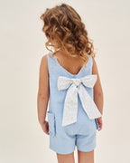 Mono de niña de plumeti azul con maxi lazo
