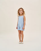 Mono de niña de plumeti azul con maxi lazo