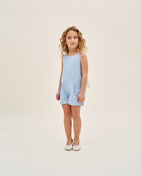 Mono de niña de plumeti azul con maxi lazo