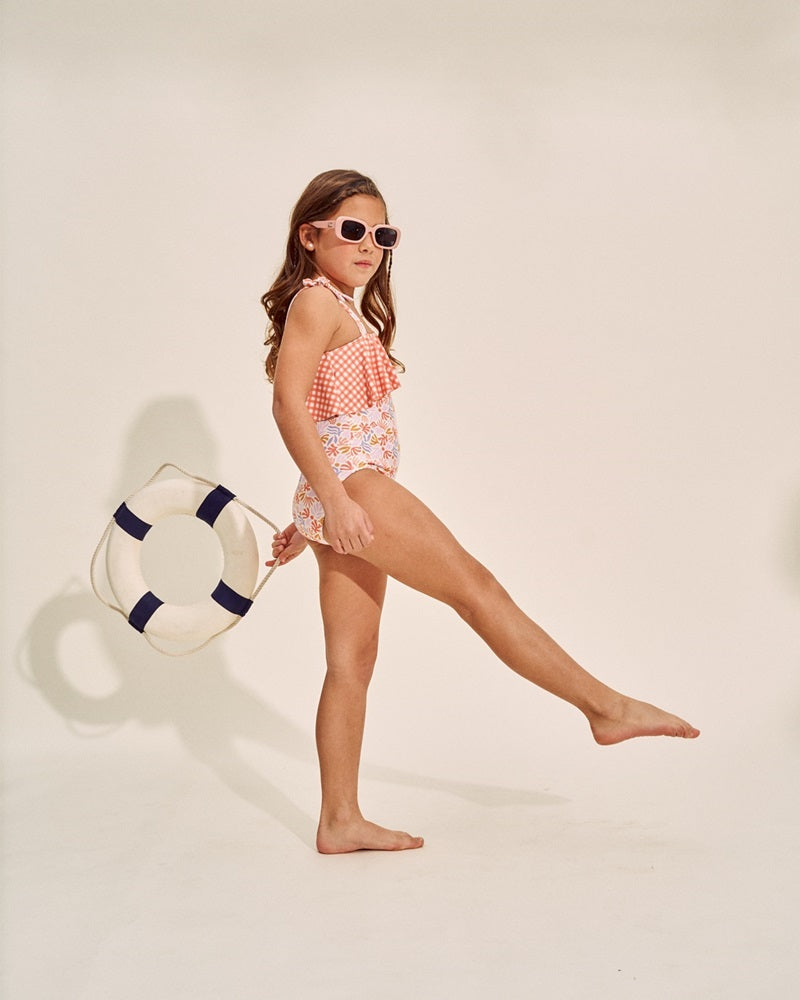 Bañador de niña con estampado floral y volante vichy naranja
