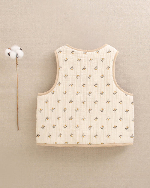 Chaleco de niña beige flores