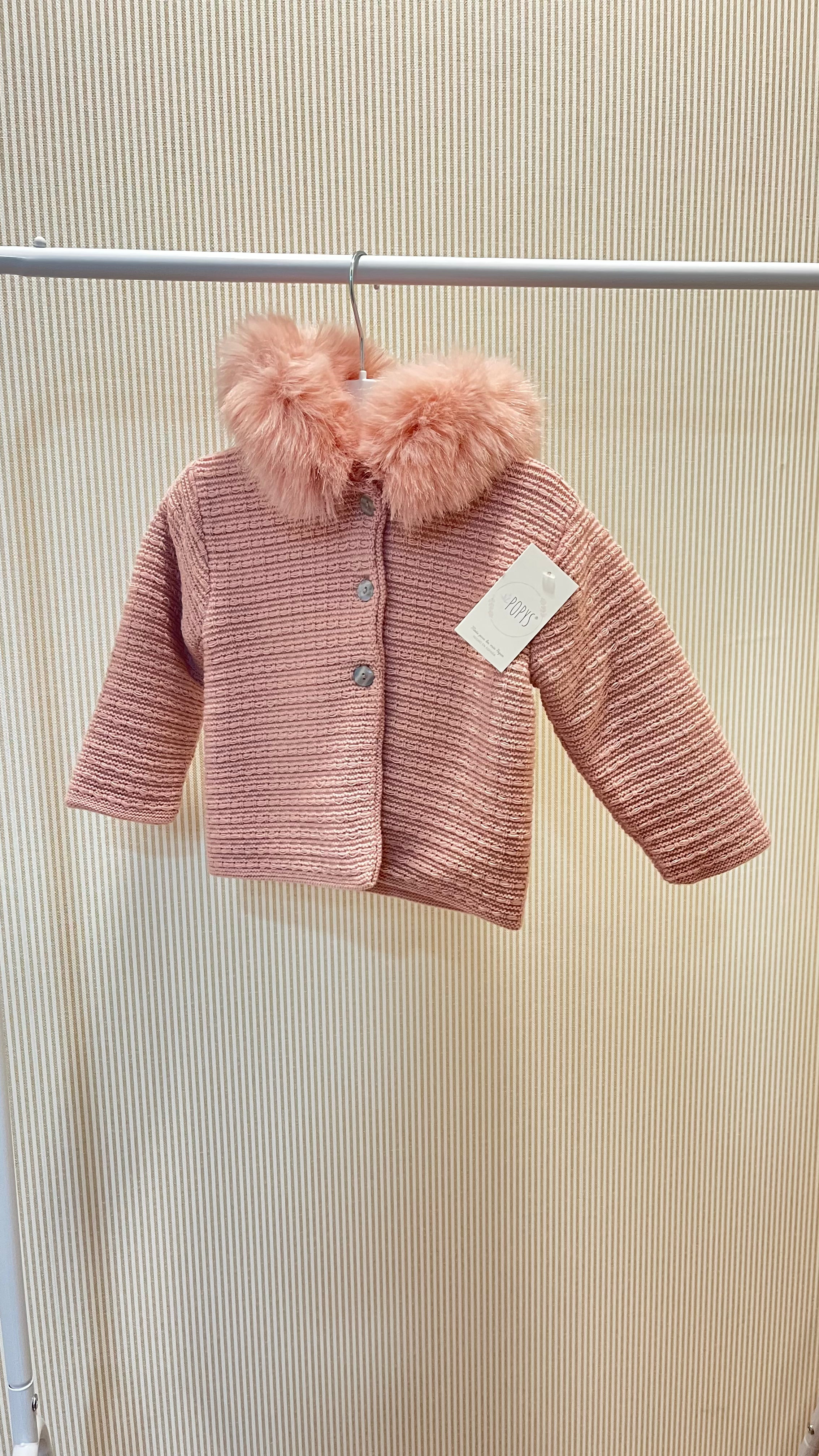 Chaqueta de punto con pelo en capucha